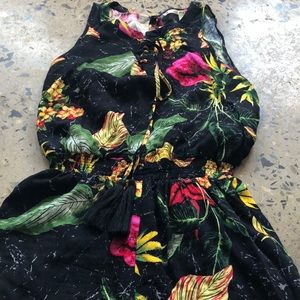 A flower romper. Chelsea and violet